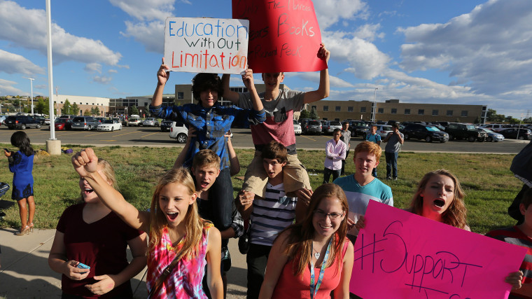 Students protest outside of Ralston Valley High School, Tuesday, Sept. 23, 2014, in Arvada, Colo. (Photo by Brennan Linsley/AP)