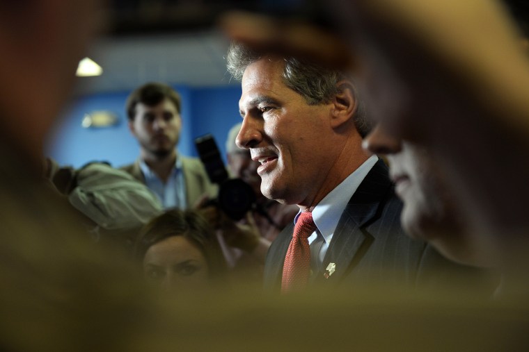Scott Brown speaks with the media at the New Hampshire GOP Salem headquarters Sept. 17, 2014 in Salem, N.H.