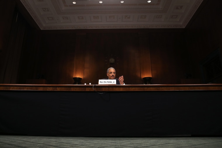 Attorney General Eric Holder testifies during a Senate Judiciary Committee hearing on Capitol Hill, on Jan. 29, 2014 in Washington, D.C. (Photo by Mark Wilson/Getty)