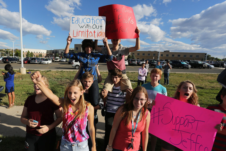 Students protest outside of Ralston Valley High School, Sept. 23, 2014, in Arvada, Colo. (Photo by Brennan Linsley/AP)