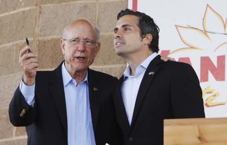 Sen. Pat Roberts, left, R-Dodge City, and Greg Orman, Independent for U.S. Senate, speak at the conclusion of their Senatorial Debate at the Kansas State Fair on Saturday, Sept. 6, 2014, in Hutchinson, Kan.