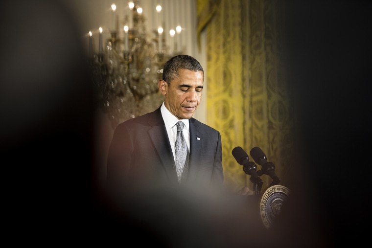 President Barack Obama pauses while speaking during an event in the East Room of the White House on May 5, 2014 in Washington, D.C.