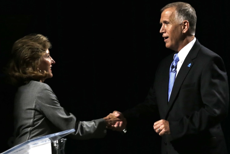 Sen. Kay Hagan, D-N.C., left, and Republican candidate for Senate Thom Tillis shake hands following a televised debate at UNC-TV studios in Research Triangle Park, N.C., on Sept. 3, 2014.