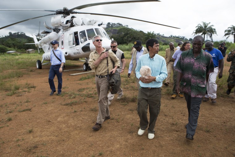 Anthony Banbury (2nd L), Special Representative and Head of the United Nations Mission for Ebola Emergency Response to Liberia, arrives at Foya in Lofa County, October 2, 2014.
