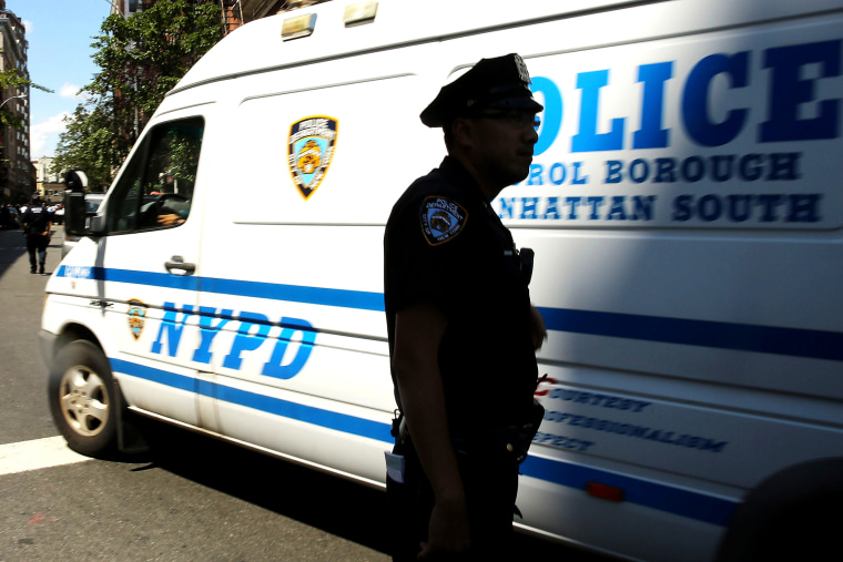 Police stand in the West Village of Manhattan, New York City, July 28, 2014.