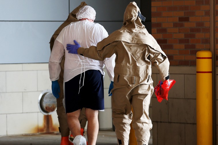 A possible Ebola patient is brought to the Texas Health Presbyterian Hospital on October 8, 2014 in Dallas, Texas.
