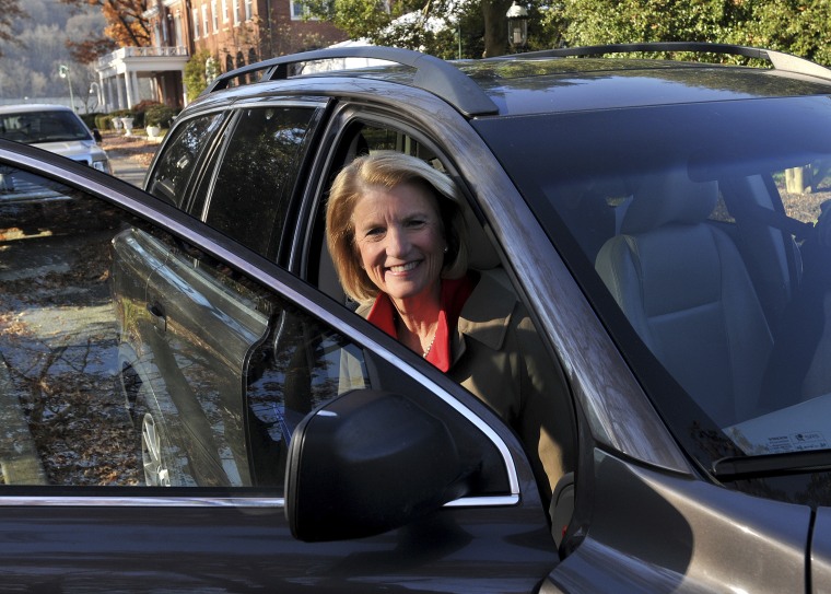Congresswoman Shelley Moore Capito gets out of her car on her way to the Capitol, where she officially announced that she will run in 2014 for the U.S. Senate, in Charleston, W.Va. Monday, Nov. 26, 2012.