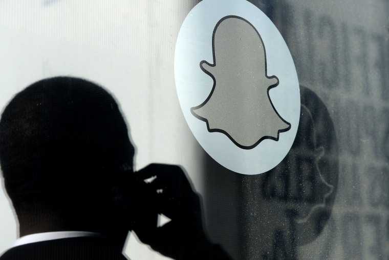The logo of Snapchat is seen at the front entrance new headquarters of Snapchat, on Nov. 14, 2013 in Venice, Calif.