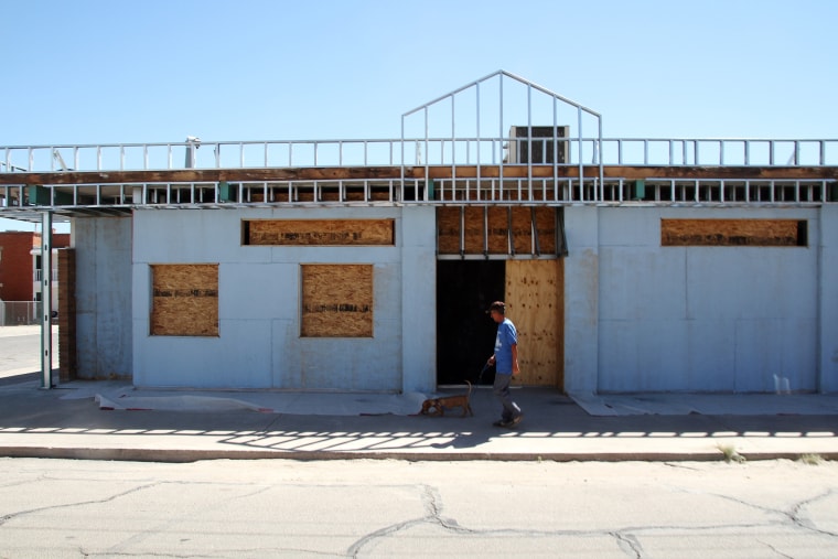 A man walks past the former site of a clinic that offered abortions in El Paso, Texas on Oct. 3, 2014.