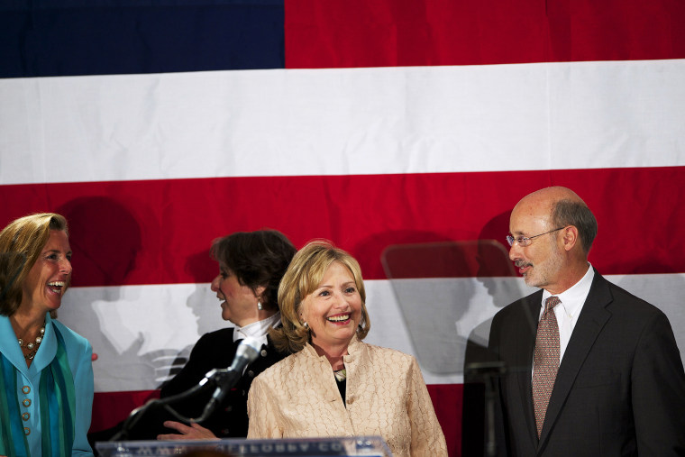 Hillary Clinton join Democratic challenger for Pennsylvania Governor Tom Wolf on stage at the National Constitution Center in Philadelphia, Penn. on Oct. 9, 2014.