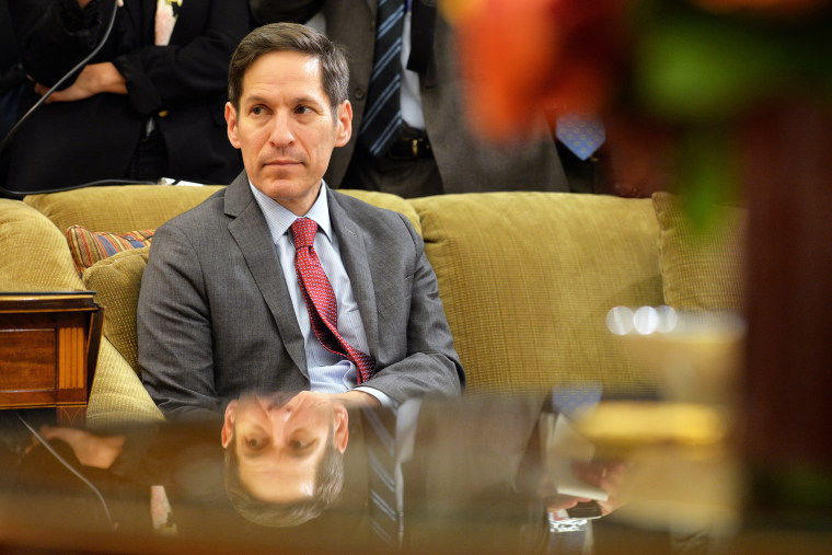 Dr. Thomas Frieden, director of the Centers for Disease Control and Prevention listens as President Barack Obama addresses the media in the Oval Office at the White House on Oct. 16, 2014 in Washington, DC. (Photo by Kevin Dietsch/Pool/Getty)