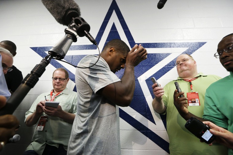 Dallas Cowboys practice squad player defensive end Michael Sam arrives to speak to reporters after team practice on Sept. 3, 2014, in Irving, Texas.