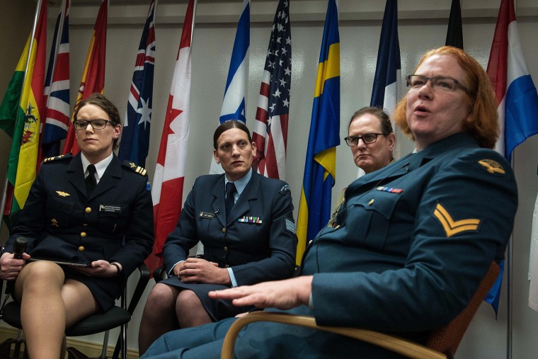From left, transgender people Major Alexandra Larsson of the Swedish Armed Forces, Sergeant Lucy Jordan of the New Zealand Air Force and Major Donna Harding of the Royal Australian Army Nursing Corps listen to Corporal Natalie Murray of the Canadian Force