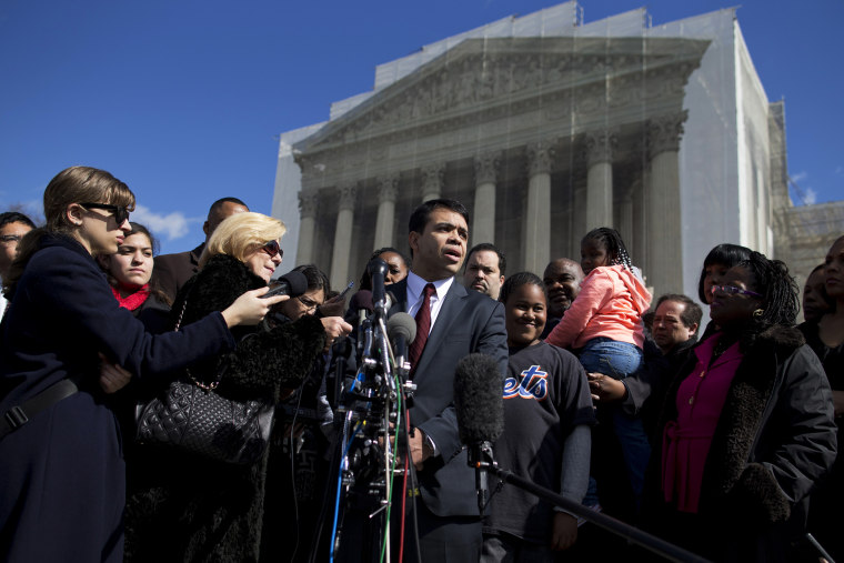 Debo Adegbile, special counsel, NAACP Legal Defense Fund, speaks with reporters outside the Supreme Court in Washington, D.C. on Feb. 27, 2013, after arguments in the Shelby County, Ala., v. Holder voting rights case.