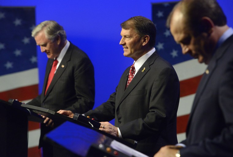 Independent candidate, Larry Pressler, left, Republican candidate, Mike Rounds, center and Democratic candidate Rick Weiland prepare before a televised U.S. Senate candidate debate Thursday night, on Oct. 23, 2014 in Vermillion, S.D.