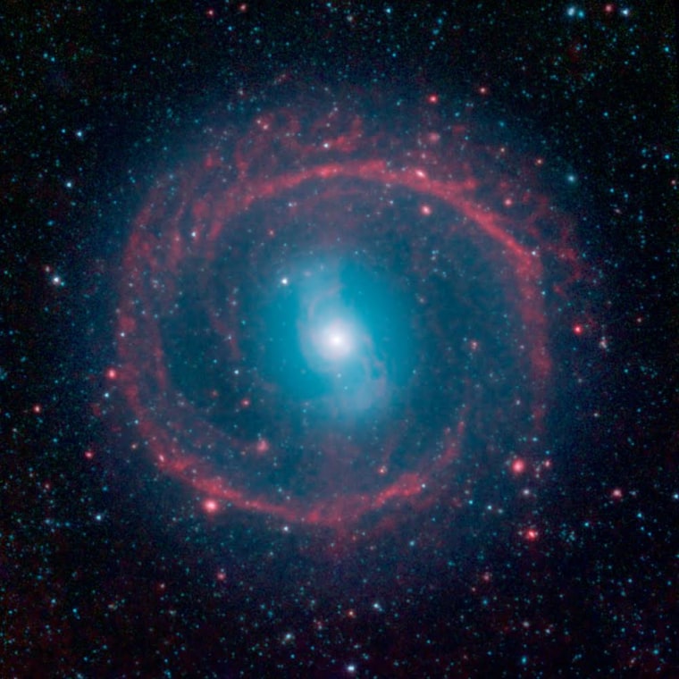 A new image from NASA's Spitzer Space Telescope, taken in infrared light, shows where the action is taking place in galaxy NGC 1291.