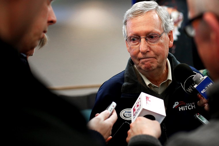 Senate Minority Leader Mitch McConnell (R-Ky.) answers questions from members of the press after speaking at a campaign rally Oct. 22, 2014 in Grayson, Ky. (Photo by Win McNamee/Getty)