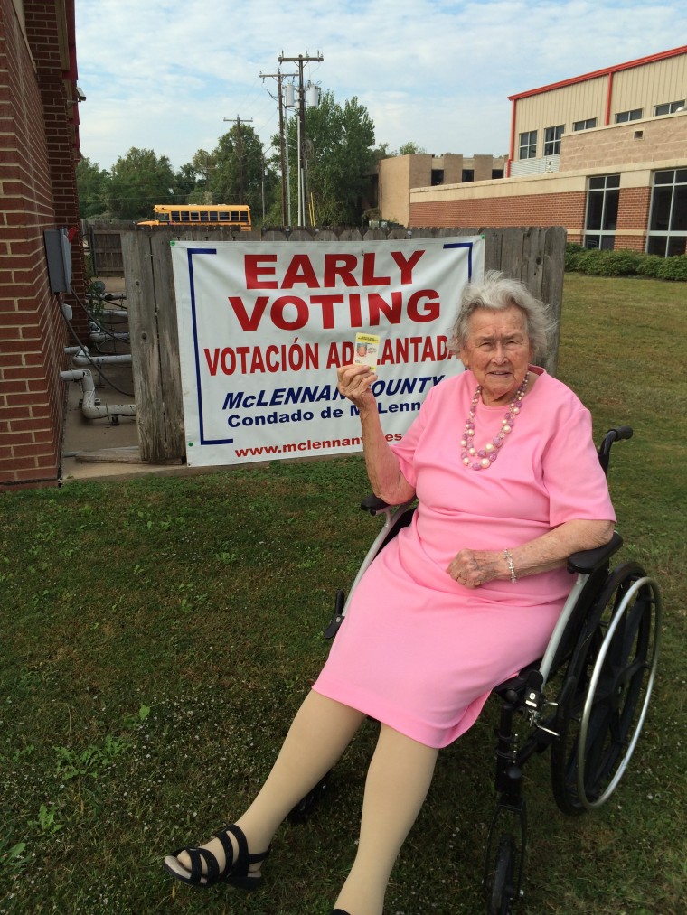 Ruby Barber holds up her voter ID card before early voting in Waco, Texas on Oct. 22.