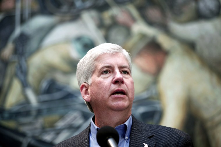 Michigan Gov. Rick Snyder speaks at a press conference at the Detroit Institute of Arts June 9, 2014 in Detroit, Mich. (Photo by Bill Pugliano/Getty)