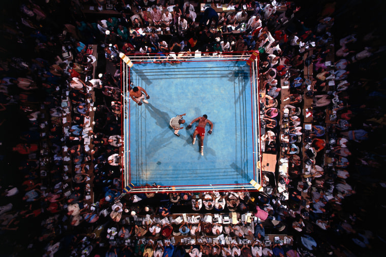 Aerial view of George Foreman on canvas during count by referee Zach Clayton after round 8 knockout by Muhammad Ali at Stade du 20 Mai in Kinshasa, Zaire on Oct. 30, 1974.