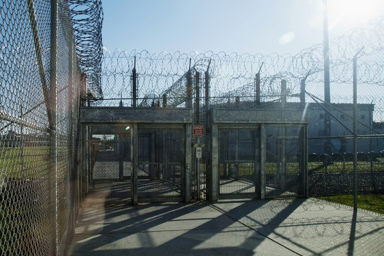 A prison fence is seen at a correctional facility.