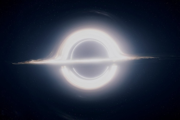A frame from the Chris Nolan's \"Interstellar,\" depicting a black hole.