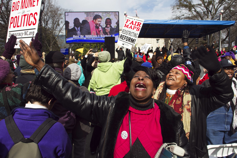 Kathy Jones reacts during the closing remarks by Rev. William Barber during the \"Moral March on Raleigh\" in Raleigh, N.C. on Feb. 8, 2014.