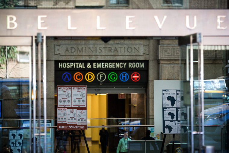 Signs regarding the ebola outbreak and treatment are posted at the entrance to Bellevue Hospital on Oct. 27, 2014 in New York, N.Y. (Photo by Andrew Burton/Getty)