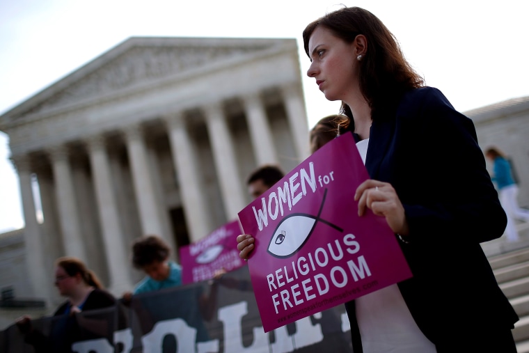 Pro-life activists gather outside the U.S. Supreme Court on June 26, 2014 in Washington, DC
