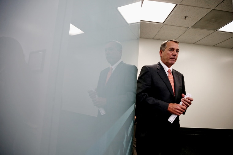 Speaker of the House John Boehner (R-OH) arrives for a news conference after the weekly House Republican caucus meeting at the U.S. Capitol on Nov. 18, 2014 in Washington, DC.