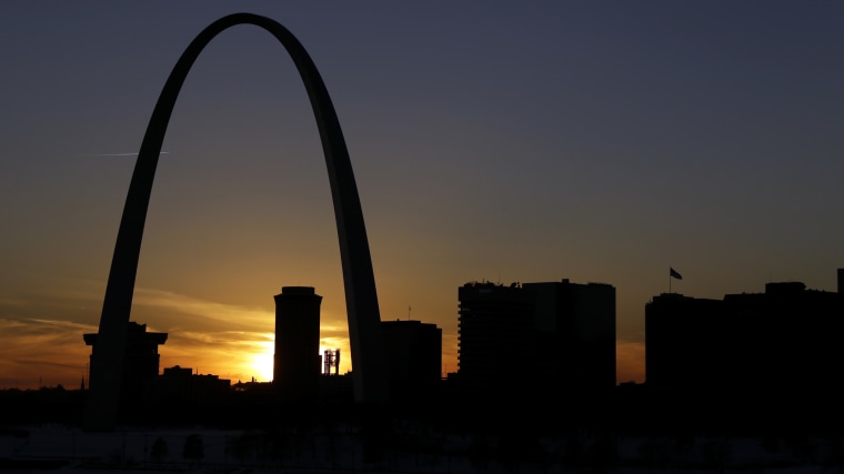 In this Jan. 7, 2014 file photo the Gateway Arch dominates the skyline in St. Louis. (Photo by Jeff Roberson/AP)