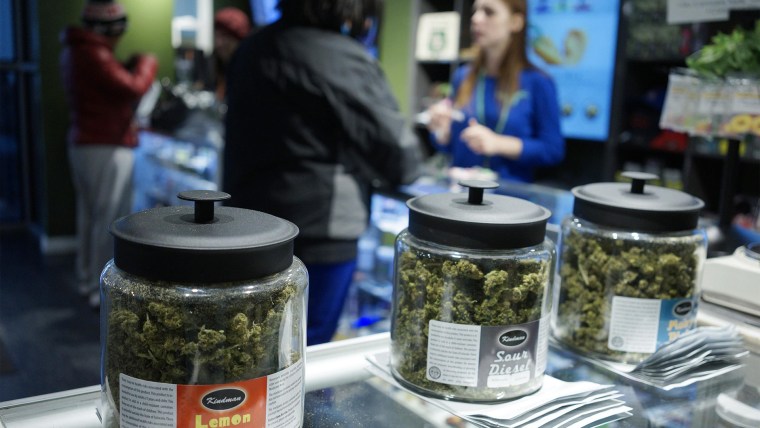 Customers shop for \"Green Friday\" deals at the Grass Station marijuana shop on Black Friday in Denver, Colo. on Nov. 28, 2014. (Rick Wilking/Reuters)