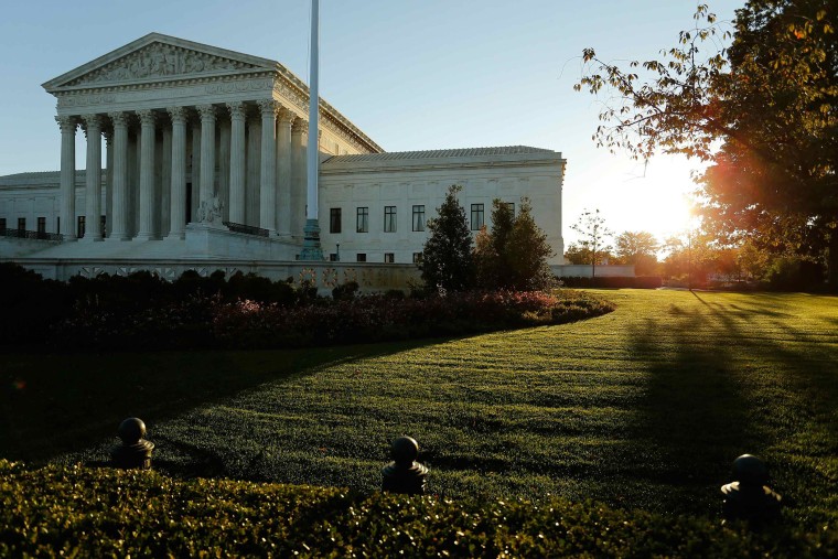 A general view of the U.S. Supreme Court building at sunrise is seen in Washington on Oct. 5, 2014.