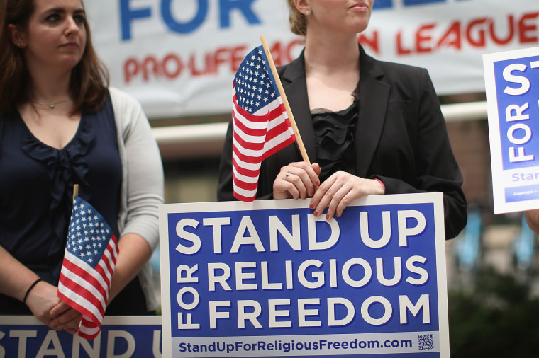 Religious freedom supporters hold a rally to praise the Supreme Court's decision in the Hobby Lobby contraception coverage requirement case on June 30, 2014 in Chicago, Ill. (Scott Olson/Getty)