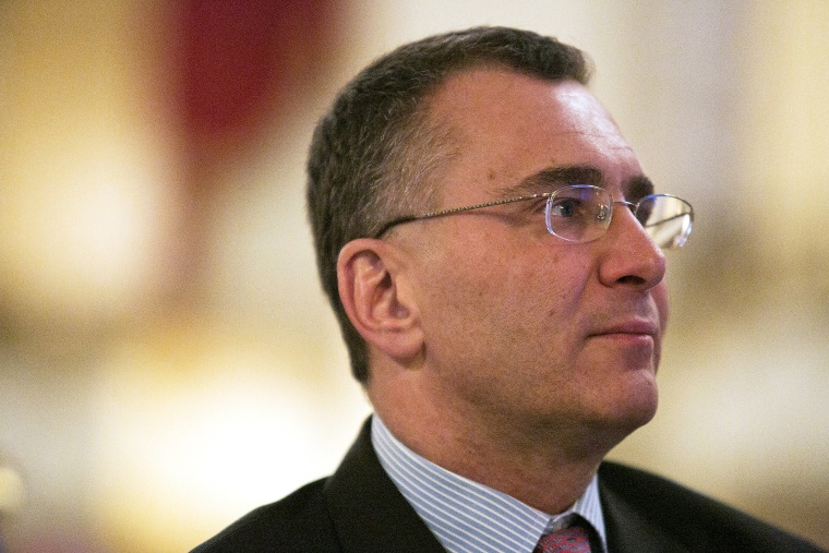 Economist Jonathan Gruber listens during a conference in Boston, Mass., March 12, 2014. (Photo by Dominick Reuter/Reuters)