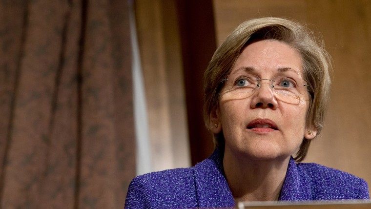 Senate Banking Committee member Sen. Elizabeth Warren listens to testimony on Capitol Hill in Washington on Nov. 12, 2013. (Jacquelyn Martin/AP)