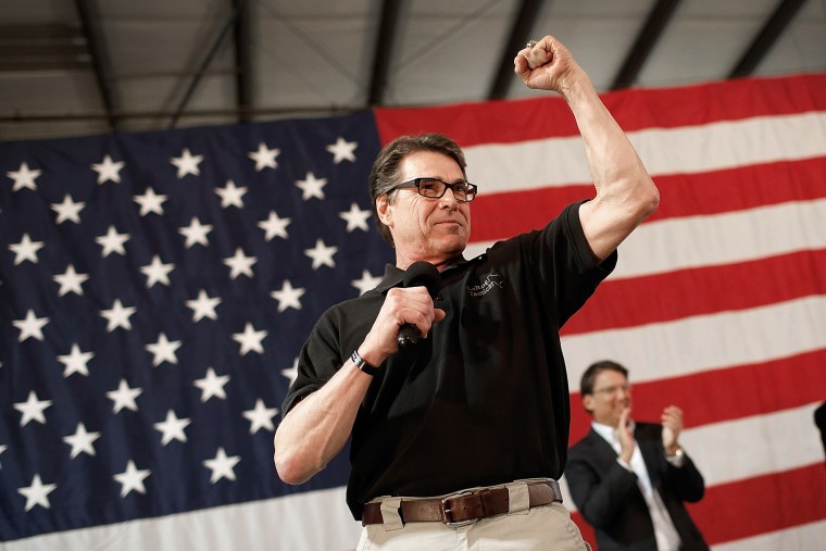 Texas Gov. Rick Perry campaigns for U.S. Senate Republican candidate and North Carolina House Speaker Thom Tills on Oct. 24, 2014 in Smithfield, N.C. (Win McNamee/Getty)