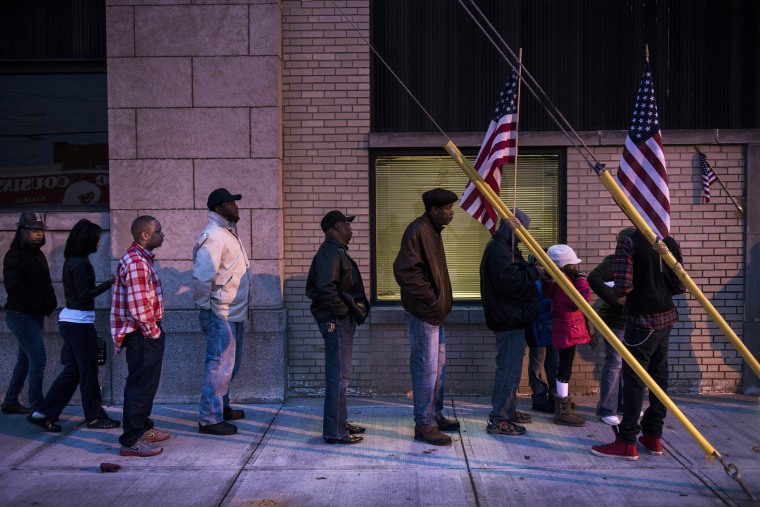 Voters wait in front of the Mt. Pleasant Library November 6, 2012 in Cleveland, Ohio. (Photo by Brendan Smialowski/AFP/Getty)
