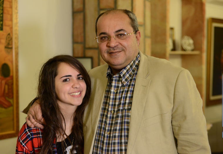 Knesset member Ahmad Tibi  with his daughter, Natalie Tibi, who is a student at Hand in Hand.