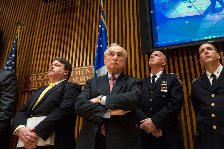 New York Police Department Commissioner Bill Bratton (C) attends a press conference on Dec. 22, 2014 in New York, NY. (Photo by Andrew Burton/Getty)