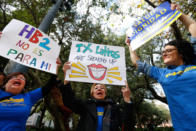 Celeste Mariuex, center, of Texas, demonstrates outside of the 5th U.S. Circuit Court of Appeals, on Jan. 7, 2015, in New Orleans.