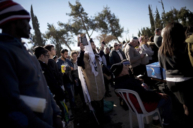 Israelis, mostly french Jews, attend the funeral of four victims of an attack on a kosher grocery store in Paris last week, in Jerusalem, on Jan. 13, 2015.