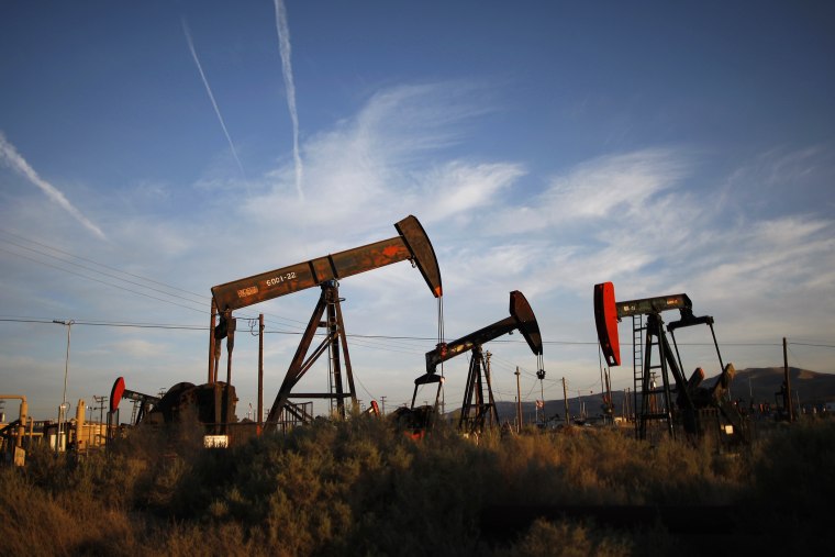 Pump jacks and wells are seen in an oil field on the Monterey Shale formation where gas and oil extraction using hydraulic fracturing, or fracking, is on the verge of a boom on March 23, 2014 near McKittrick, Calif. (Photo by David McNew/Getty)