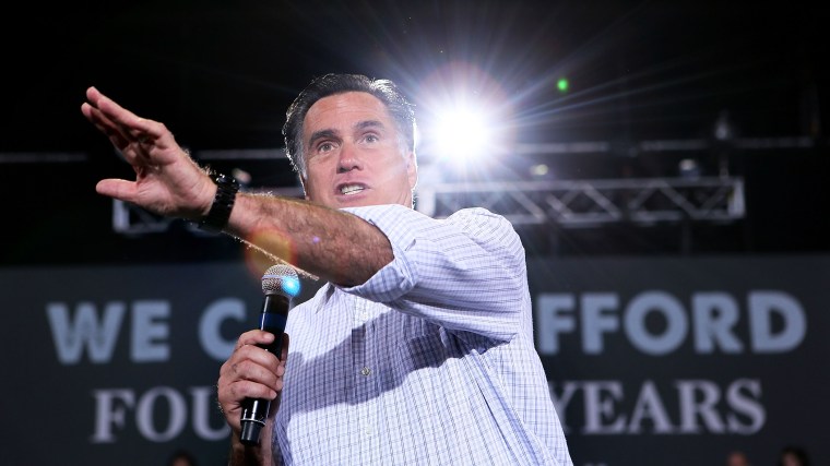Then, Republican U.S. presidential candidate Mitt Romney speaks during a campaign rally at SeaGate Convention Centre on Sept. 26, 2012 in Toledo, Ohio. (Photo by Alex Wong/Getty)
