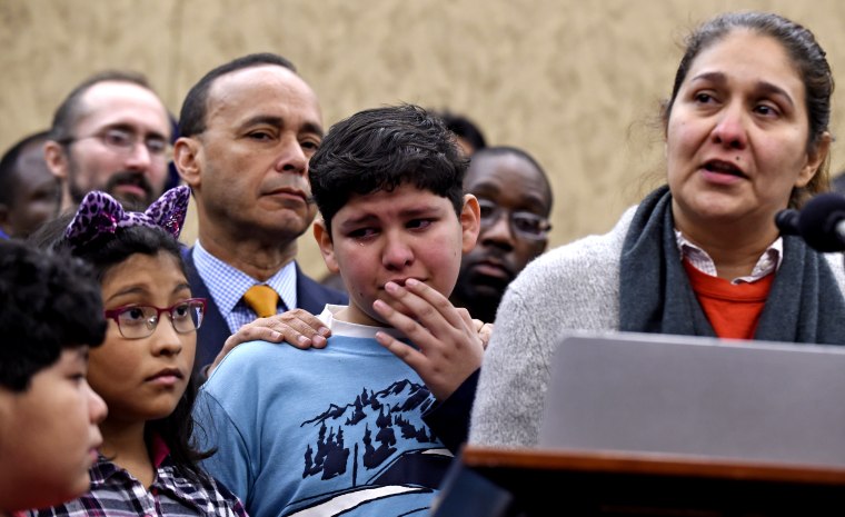 Isabel Aguilar, Adolfo Martinez, Miranda Martinez, Emilio Martinez, Luis V. Gutierrez (Photo by Susan Walsh/AP)