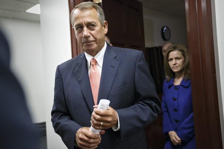 House Speaker John Boehner leaves a closed-door meeting of the House Republican Conference, on Capitol Hill in Washington, on Jan. 13, 2015. (Photo by J. Scott Applewhite/AP)
