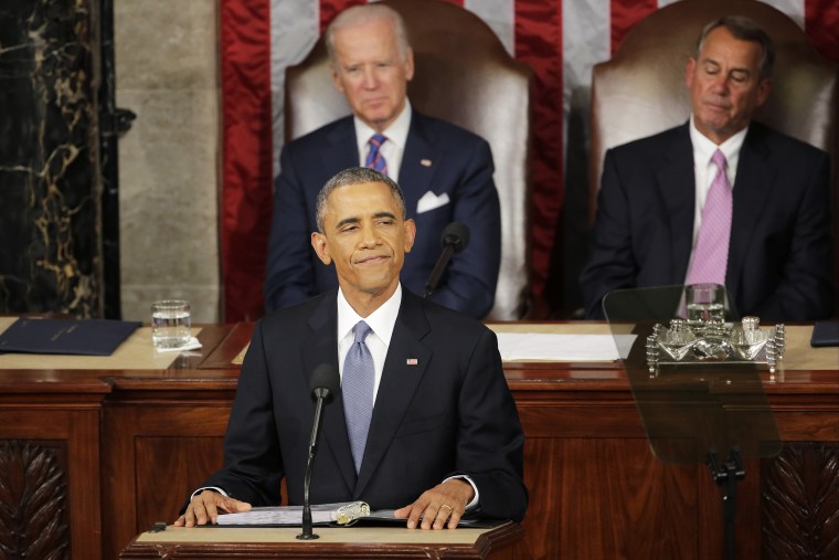 President Barack Obama pauses during his State of the Union address before a joint session of Congress on Capitol Hill in Washington, D.C., Jan. 20, 2015. (Photo by J. Scott Applewhite/AP)