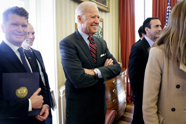 U.S. Vice President Joseph Biden (C) looks on during a meeting between U.S. President Barack Obama and British Prime Minister David Cameron in the Oval Office of the White House Jan. 16, 2015 in Washington, DC. (Photo by Alex Wong/Getty)