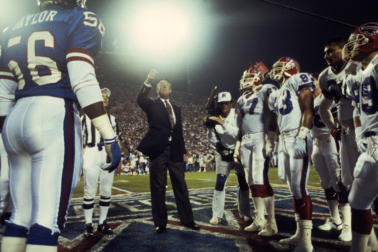 NFL Commissioner Pete Rozelle tosses the coin before a 20-19 New York Giants win over the Buffalo Bills in Super Bowl XXV on January 27, 1991 at Tampa Stadium in Tampa Bay, Fla.