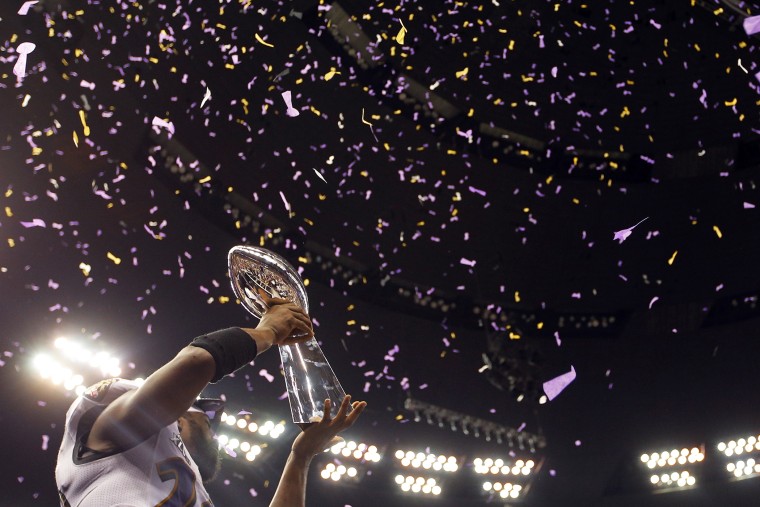 Baltimore Ravens free safety Ed Reed holds up the Vince Lombardi Trophy after his team defeated the San Francisco 49ers in the NFL Super Bowl XLVII football game in New Orleans, La., Feb., 3, 2013.